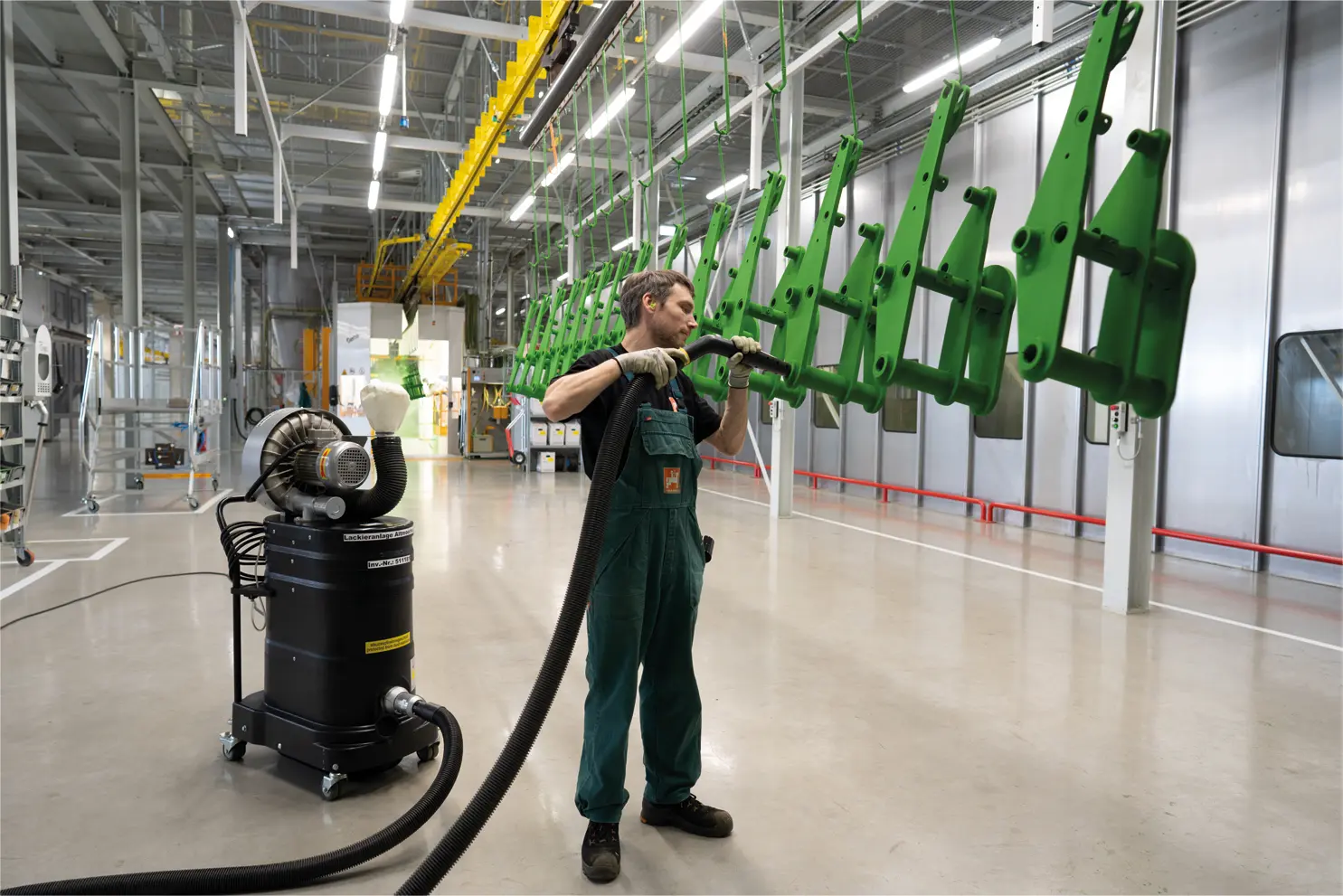 Cleaning of drilled holes after powder coating
